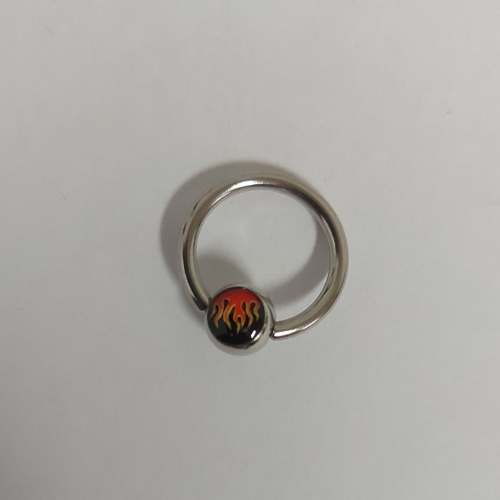 Silver Ring with Flame Design